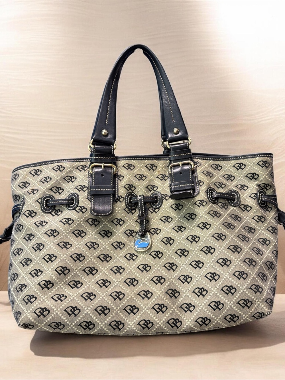 Dooney & Bourke Beige Monogram Tote with Black Trim